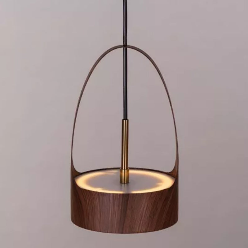 Lampada a sospensione a mano con venature del legno