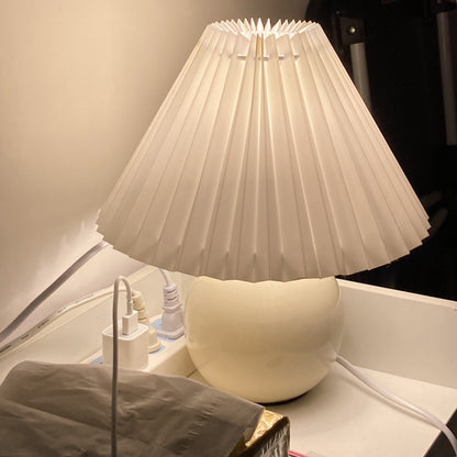 Lampe de table plissée en céramique